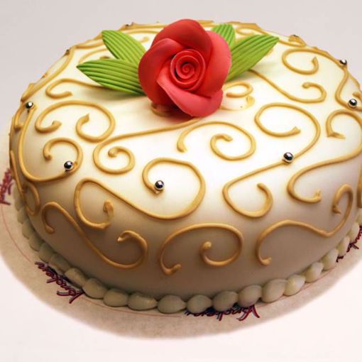 Afbeelding van Goud gouden swirl taart