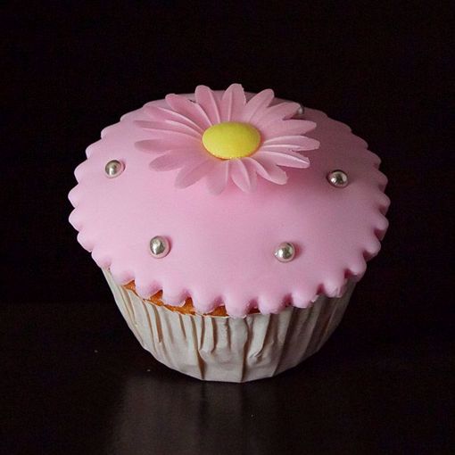Afbeelding van Muffin met fondant en roze magriet